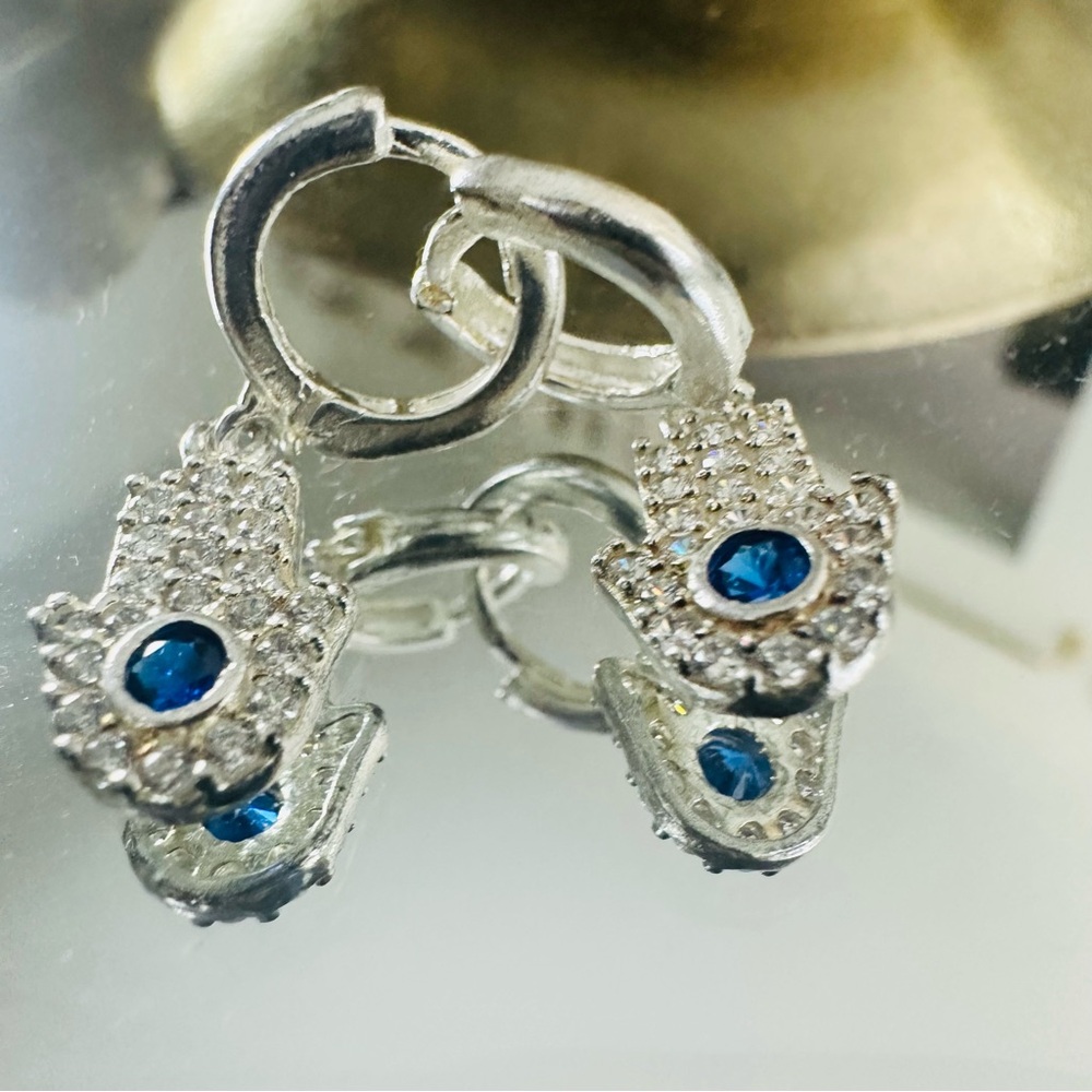 Elegant Silver Hamsa Earrings with Blue Zircon Accents - Picture 7 of 10
